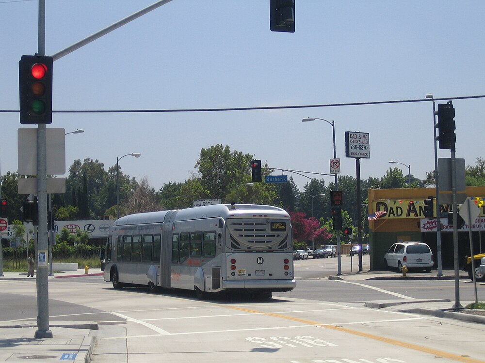 Metro G Line (Orange Line) bus crossing an at-grade intersection on the Chandler Blvd busway